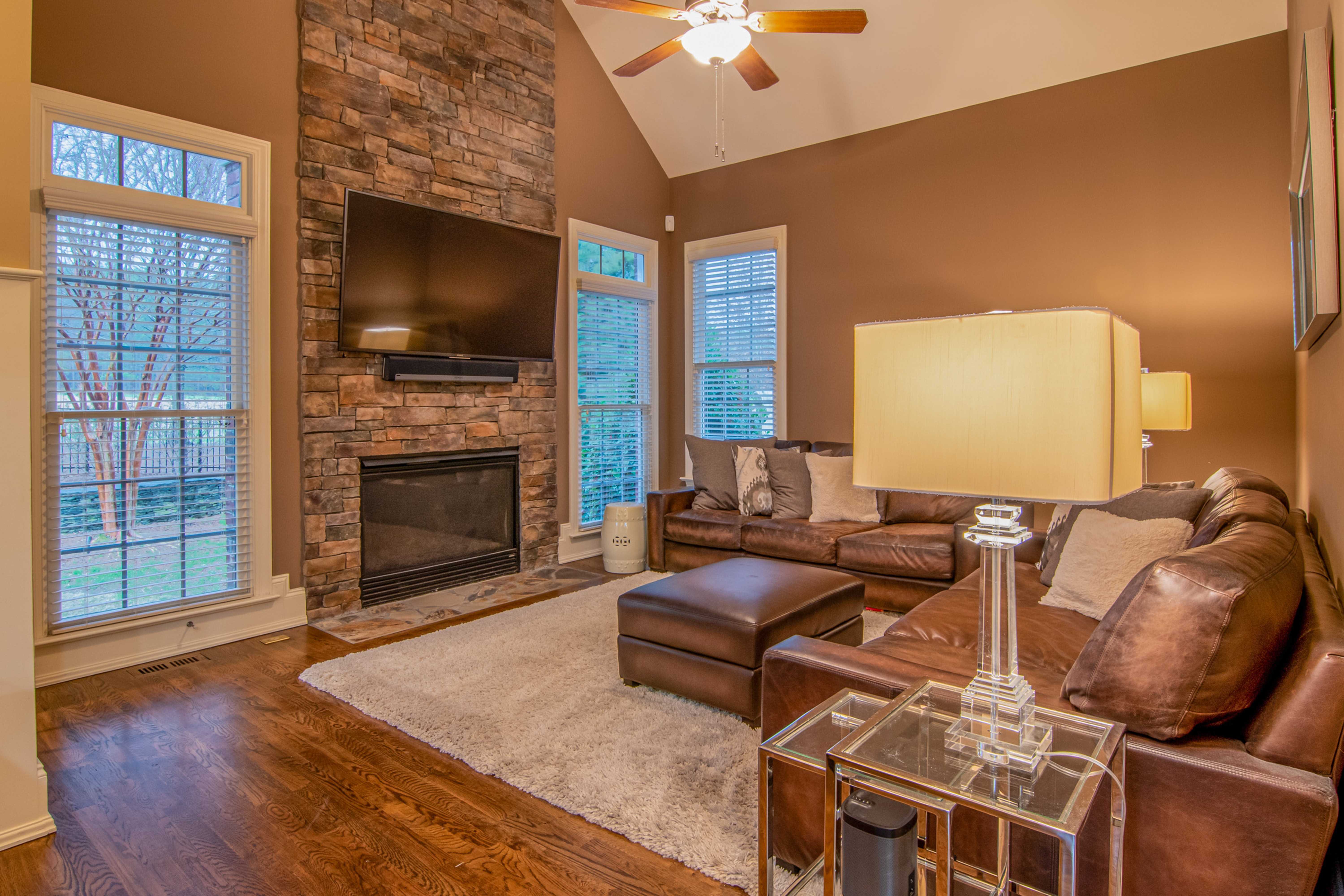 MCLEAN, VA, beautiful living room with stone chimney accent wall
